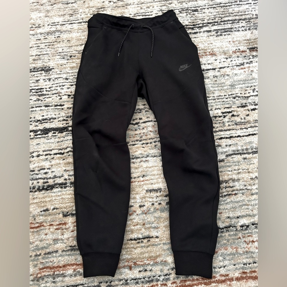 OVER 75% OFF Nike tech pants great for back to school
